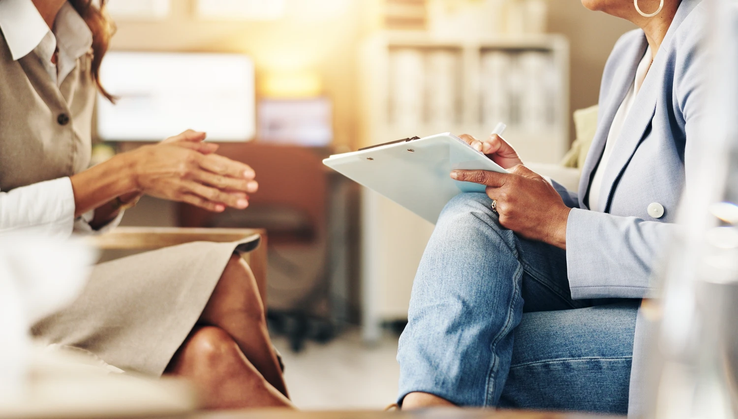 Hands, therapist and checklist for counselling, advice and professional for support in office.